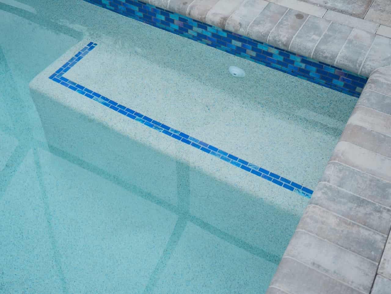 Custom mosaic tile steps detail — Good Life Pools