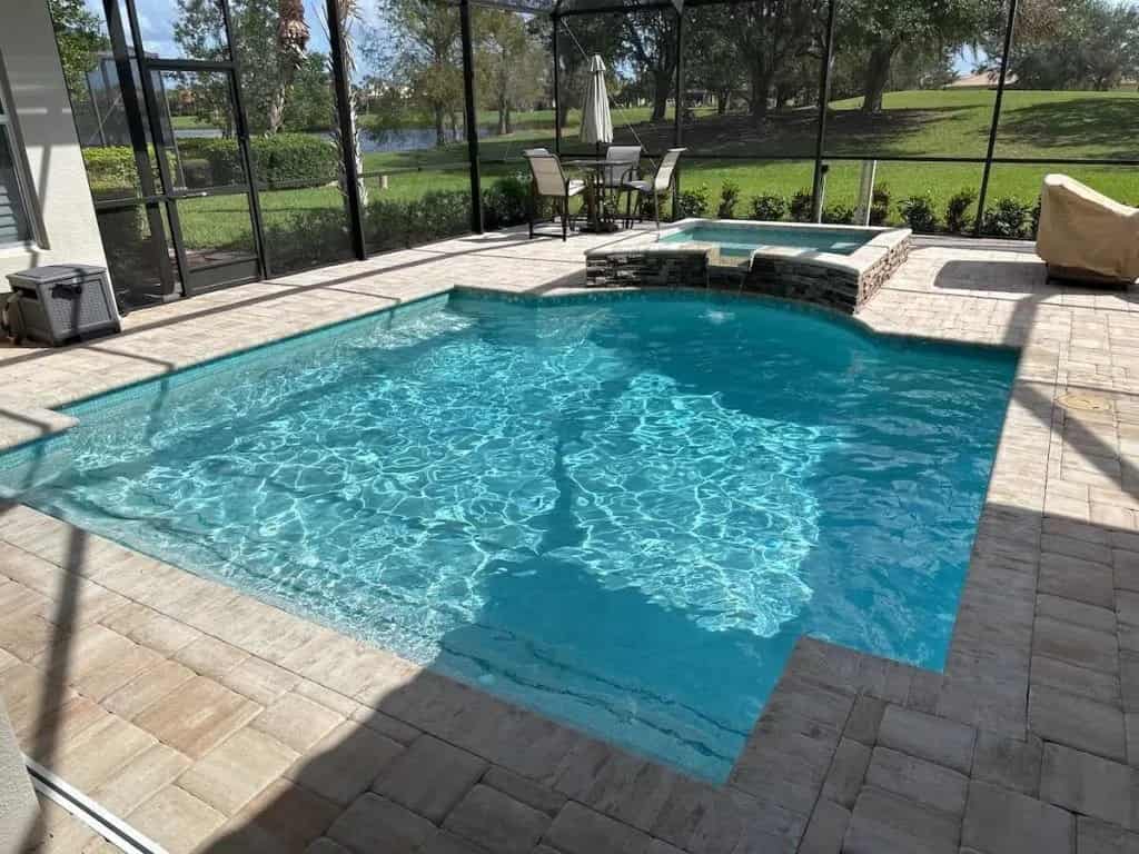 Pool and spa with golf course views — Sarasota, FL